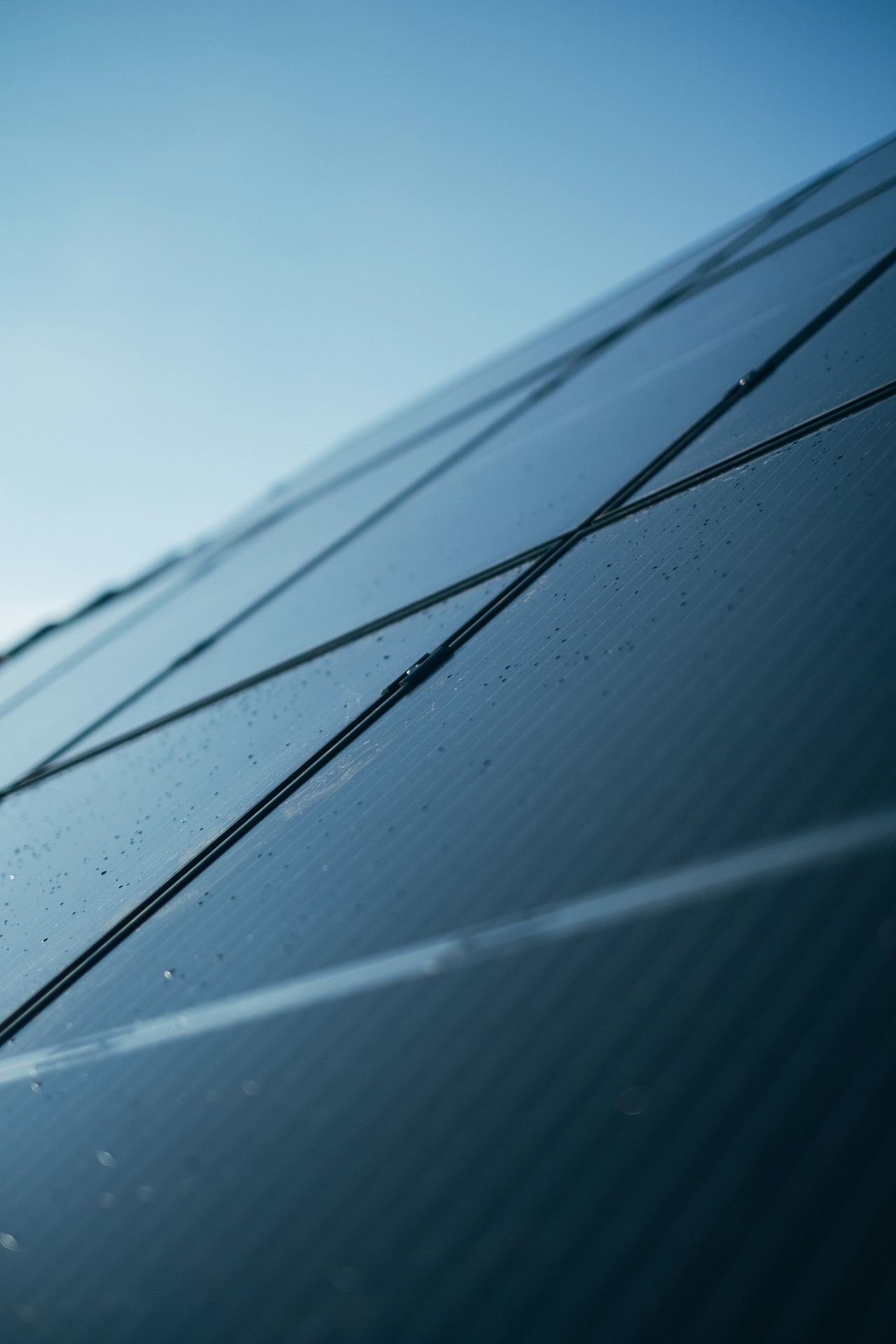 A close up of a solar panel on a building